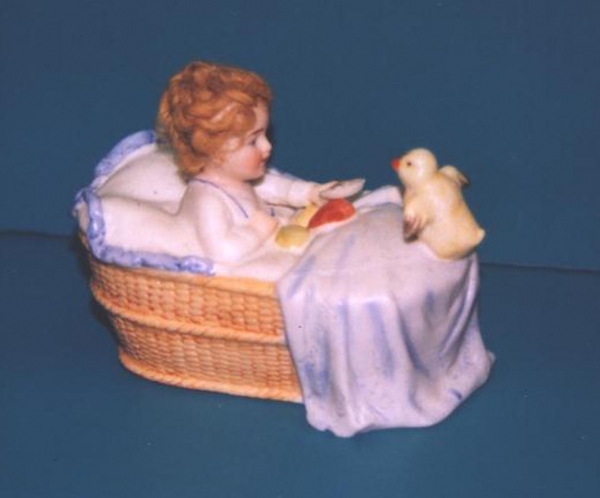 Child with Chick in Basket  Pottery Bank