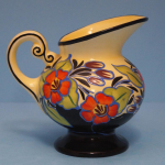 Click to view Vintage Czech Art Pottery Pitcher  photos