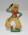 Click to view Antique Cowboy Cast Iron Paperweight photos