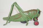 Click to view Antique Grasshopper Cast Iron Pull Toy photos