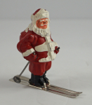 Click to view Skiing Santa Claus Cast Metal Barclay 3” Fig. photos