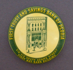 Click to view Peoria Illinois Celluloid Dime Still Bank photos