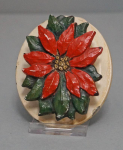 Click to view Antique Poinsettia Doorknocker photos