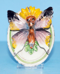 Click to view Antique Butterfly Cast Iron Doorknocker photos
