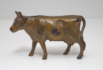 Click to view Antique Cow Cast Iron Penny Still Bank photos
