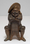 Click to view Man in Chair Cigar Lighter, Match Safe photos