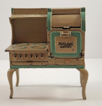 Click to view Antique Hotpoint Electric Stove Cast Iron Toy photos